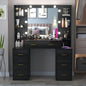 Black vanity desk with mirror and lights in a bedroom setting