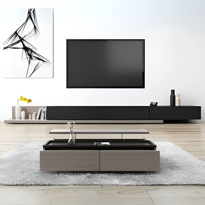 Modern living room with a black TV console, television, and abstract art.