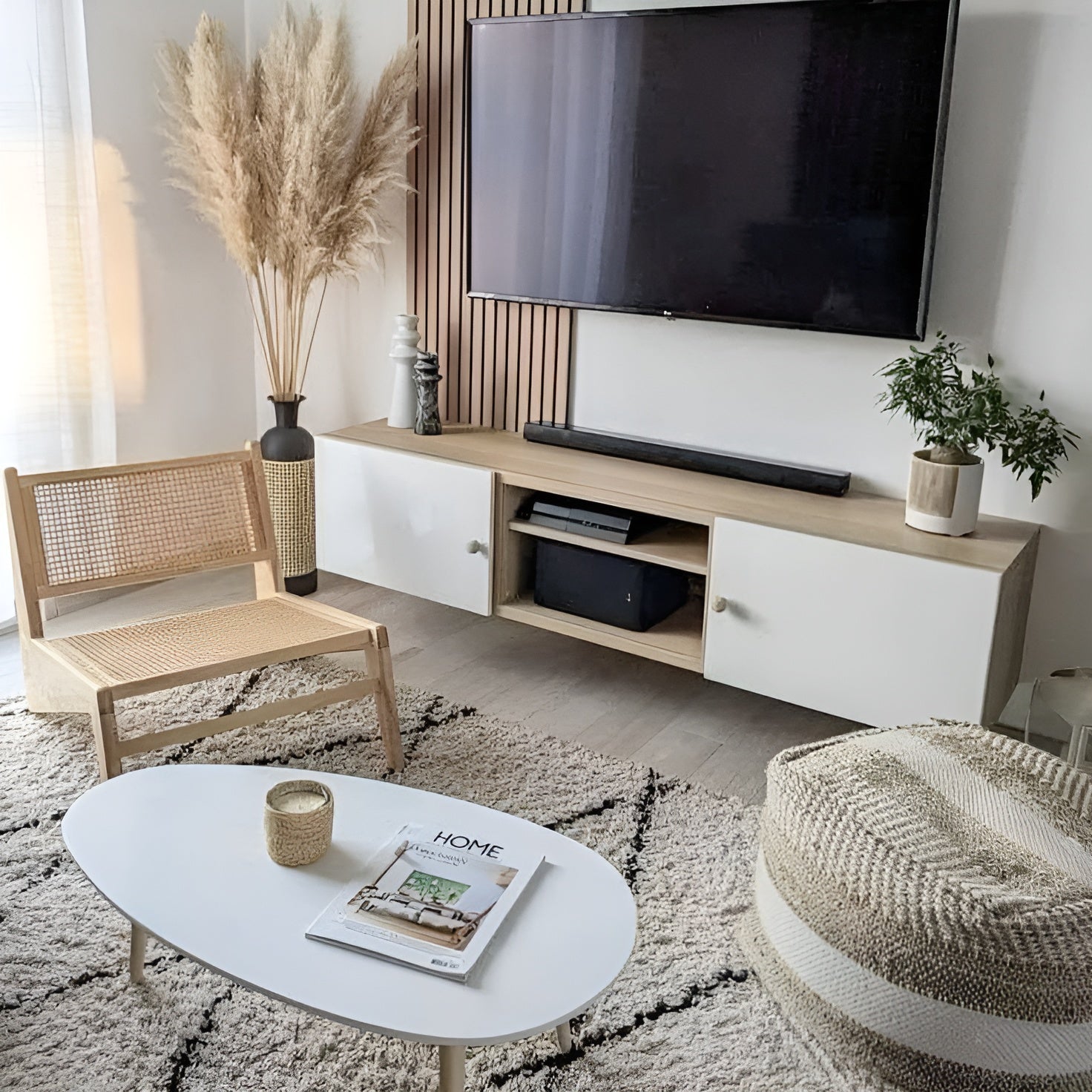 Modern living room with a TV stand, chair, and coffee table.