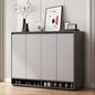Modern shoe cabinet with shoes underneath in a room setting