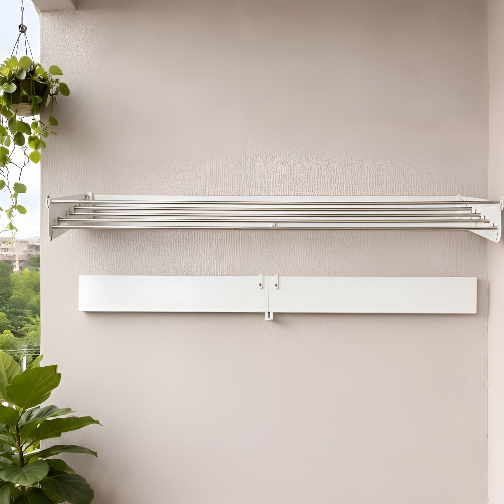 Towel rack mounted on a wall with plants around