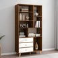 Wooden bookshelf with books and decorative items against a white wall