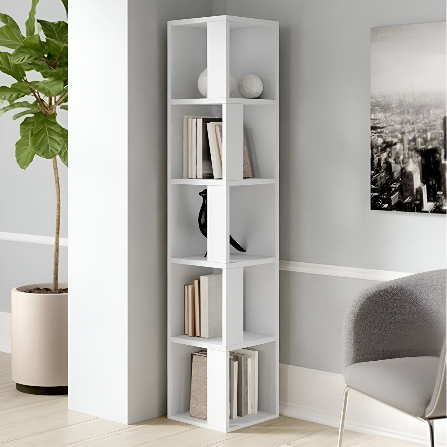 White bookshelf with books and decor items in a room with a plant and wall art.