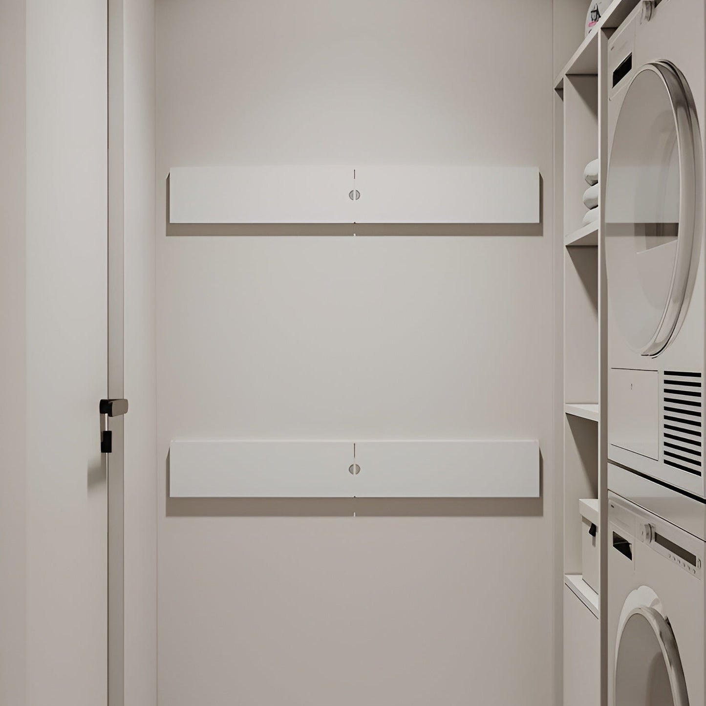 Modern laundry room with white cabinets and appliances.