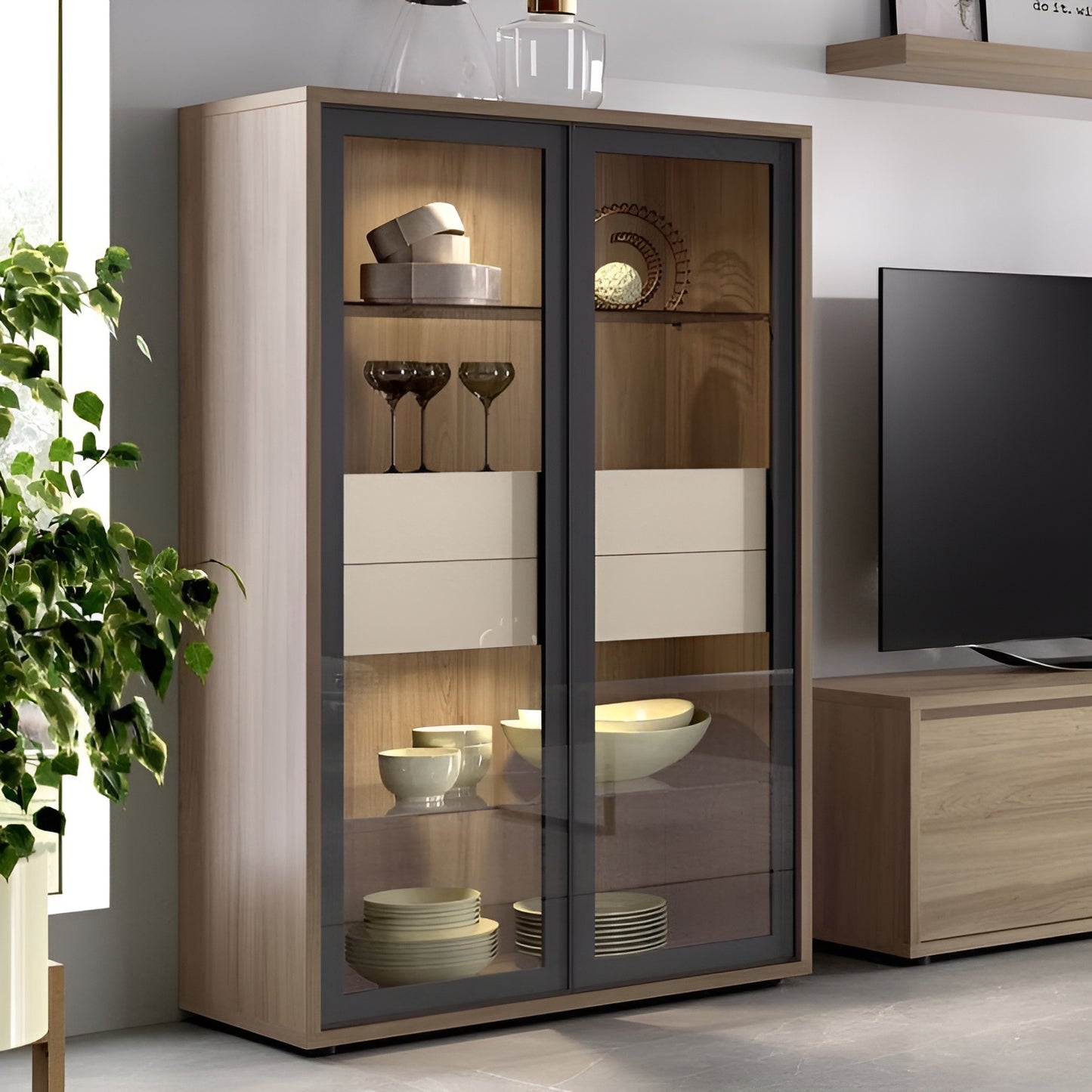 Wooden display cabinet with glass doors in a room setting with a TV and plant.