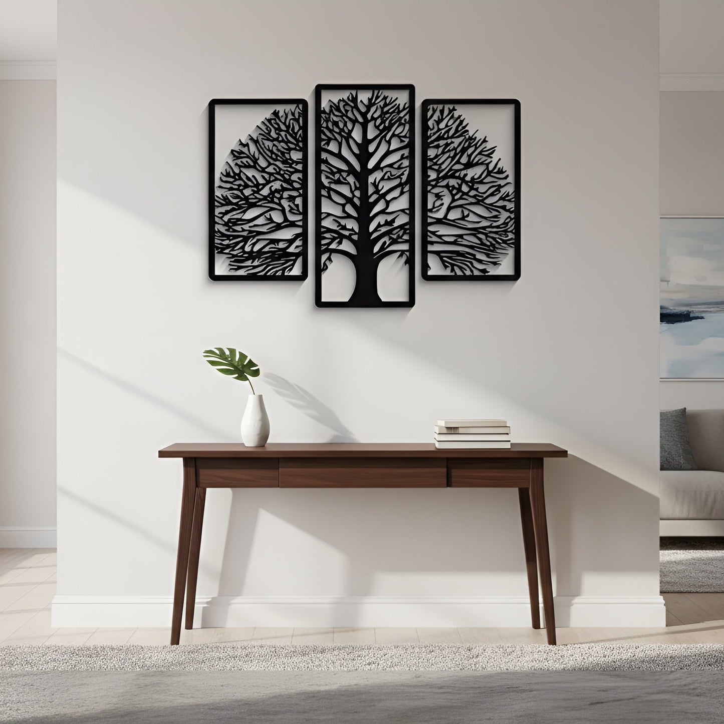 Modern living room with a wooden desk, decorative wall art, and a sofa.