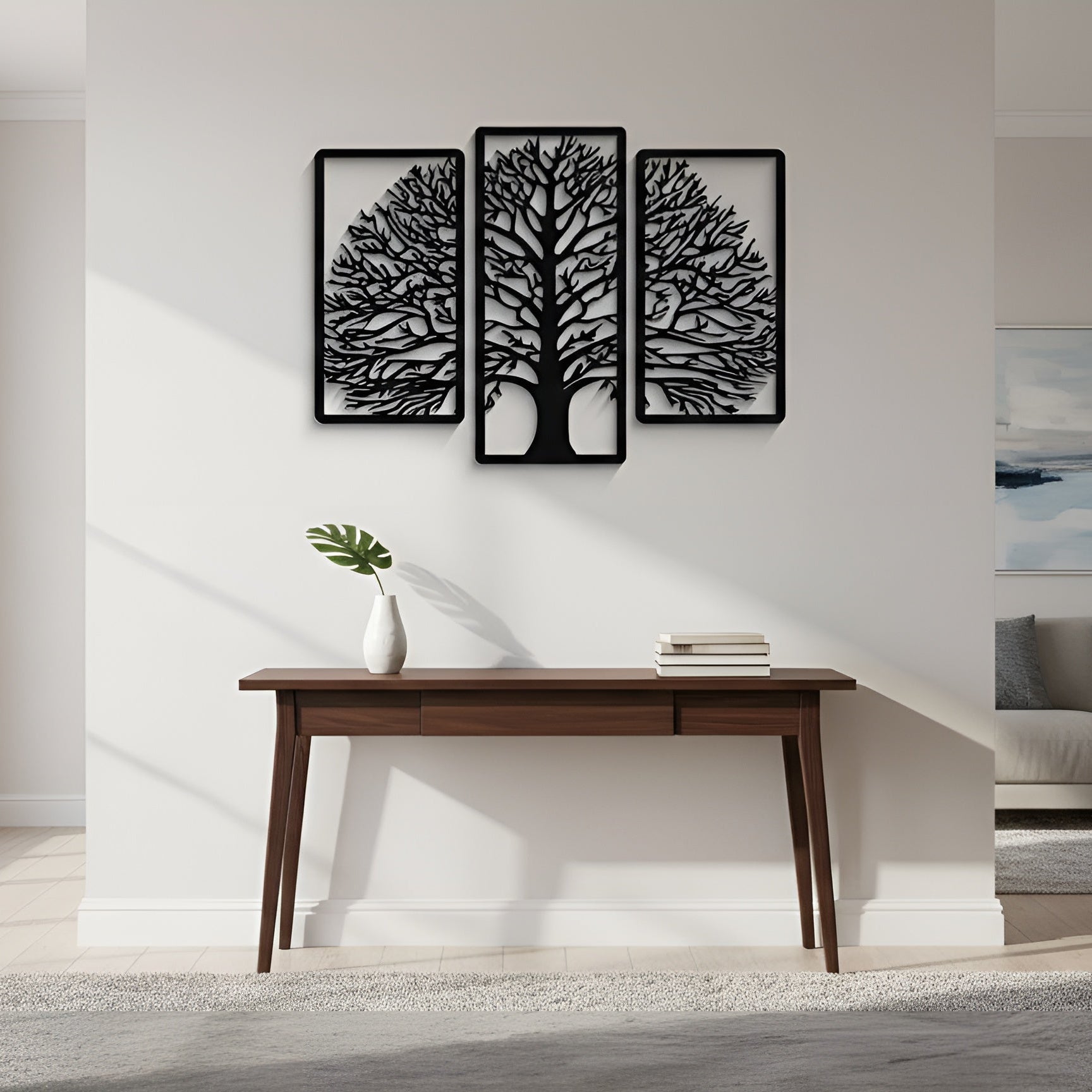 Modern living room with a wooden desk, decorative wall art, and a sofa.