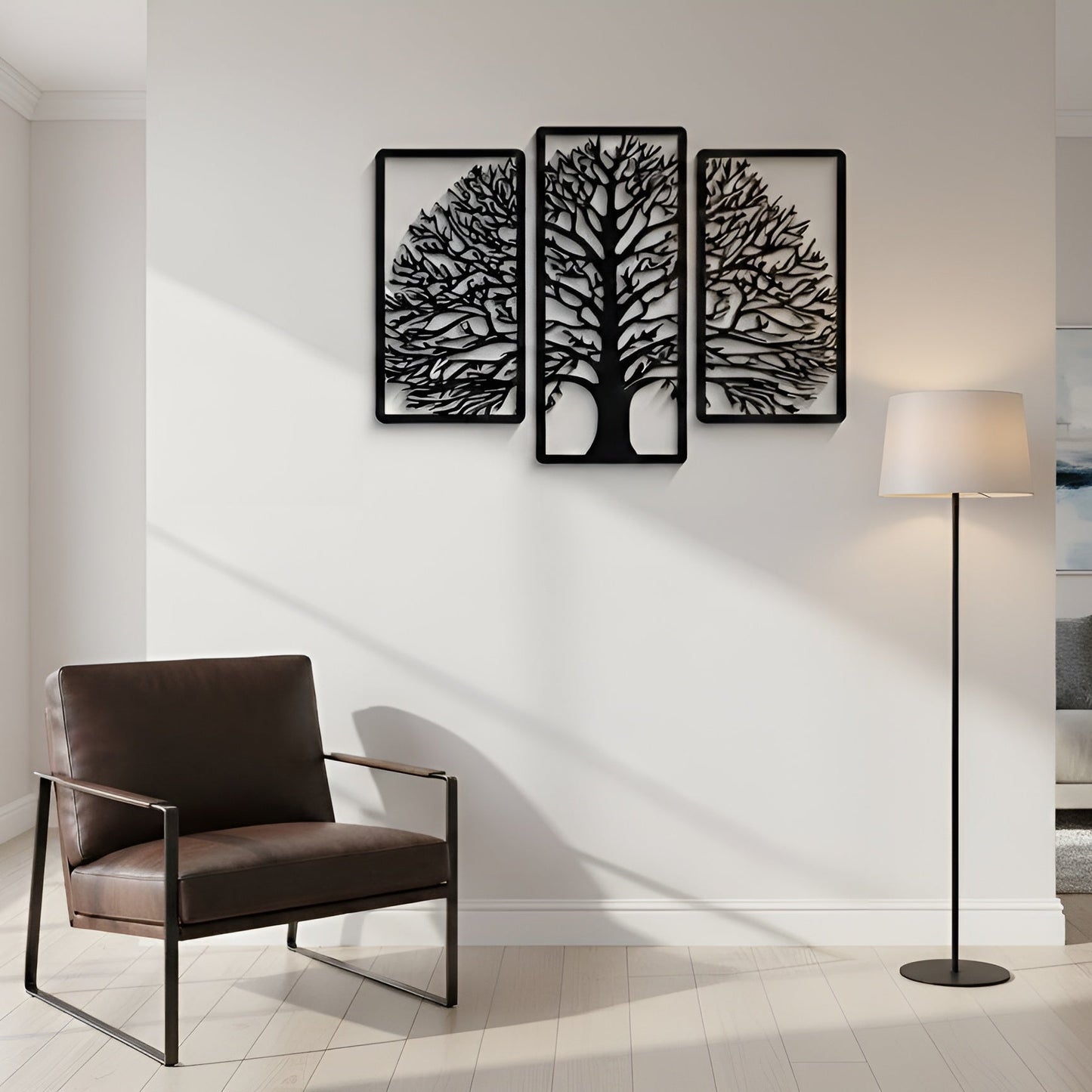 Modern living room with a brown armchair, floor lamp, and wall art of trees.