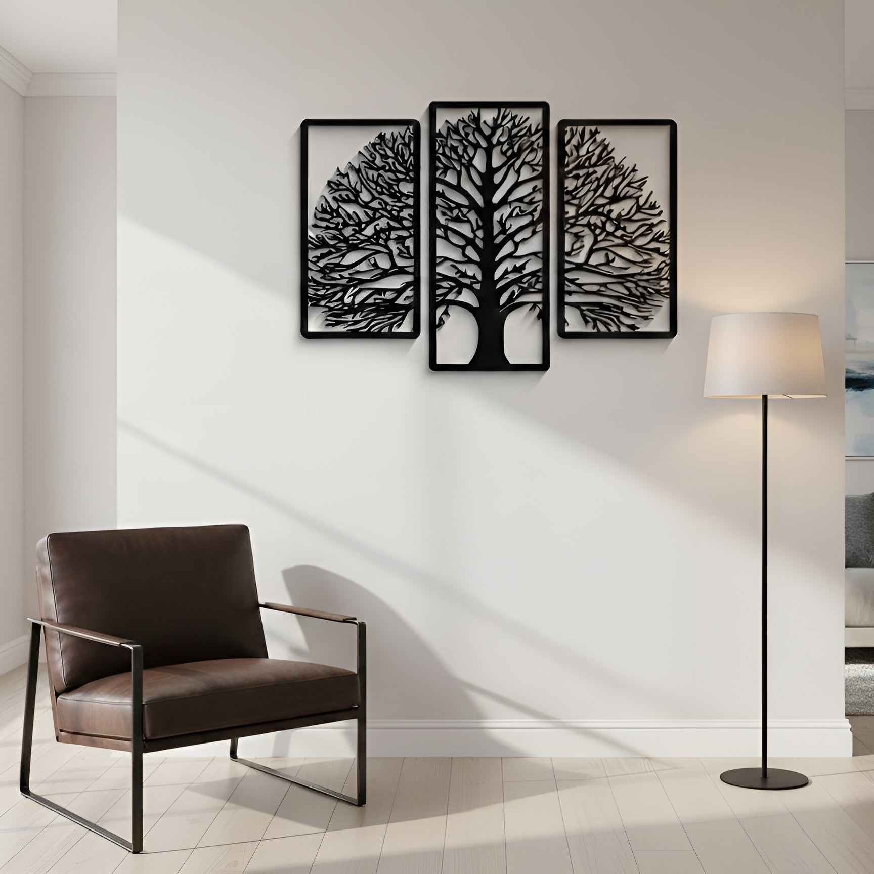 Modern living room with a brown armchair, floor lamp, and wall art of trees.