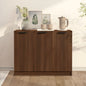 Wooden cabinet with decorative items on a light wooden floor and white wall background