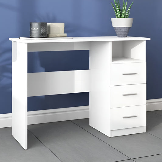 White desk with drawers against a blue wall