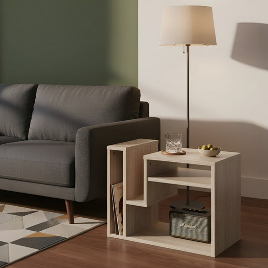 Modern living room with a gray sofa, wooden side table, and floor lamp.