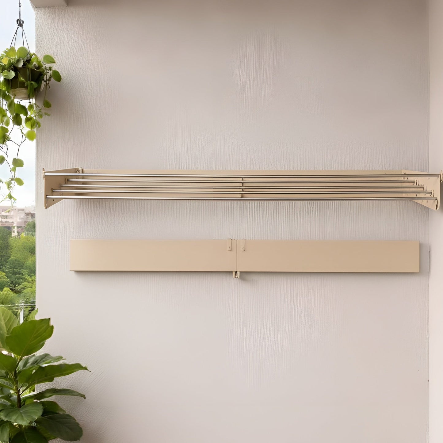 Wall-mounted radiator on a white wall with potted plants below