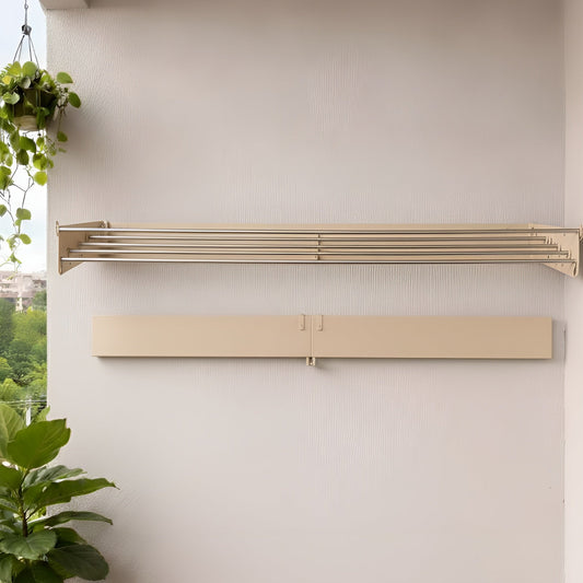 Wall-mounted radiator on a white wall with potted plants below