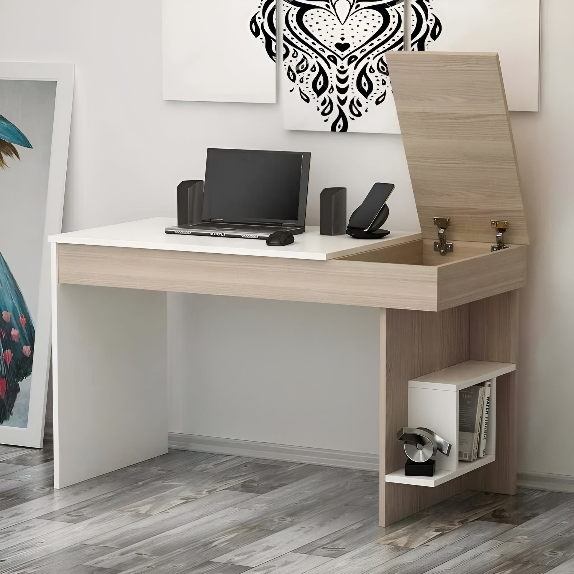 Wooden desk with computer setup against a white wall