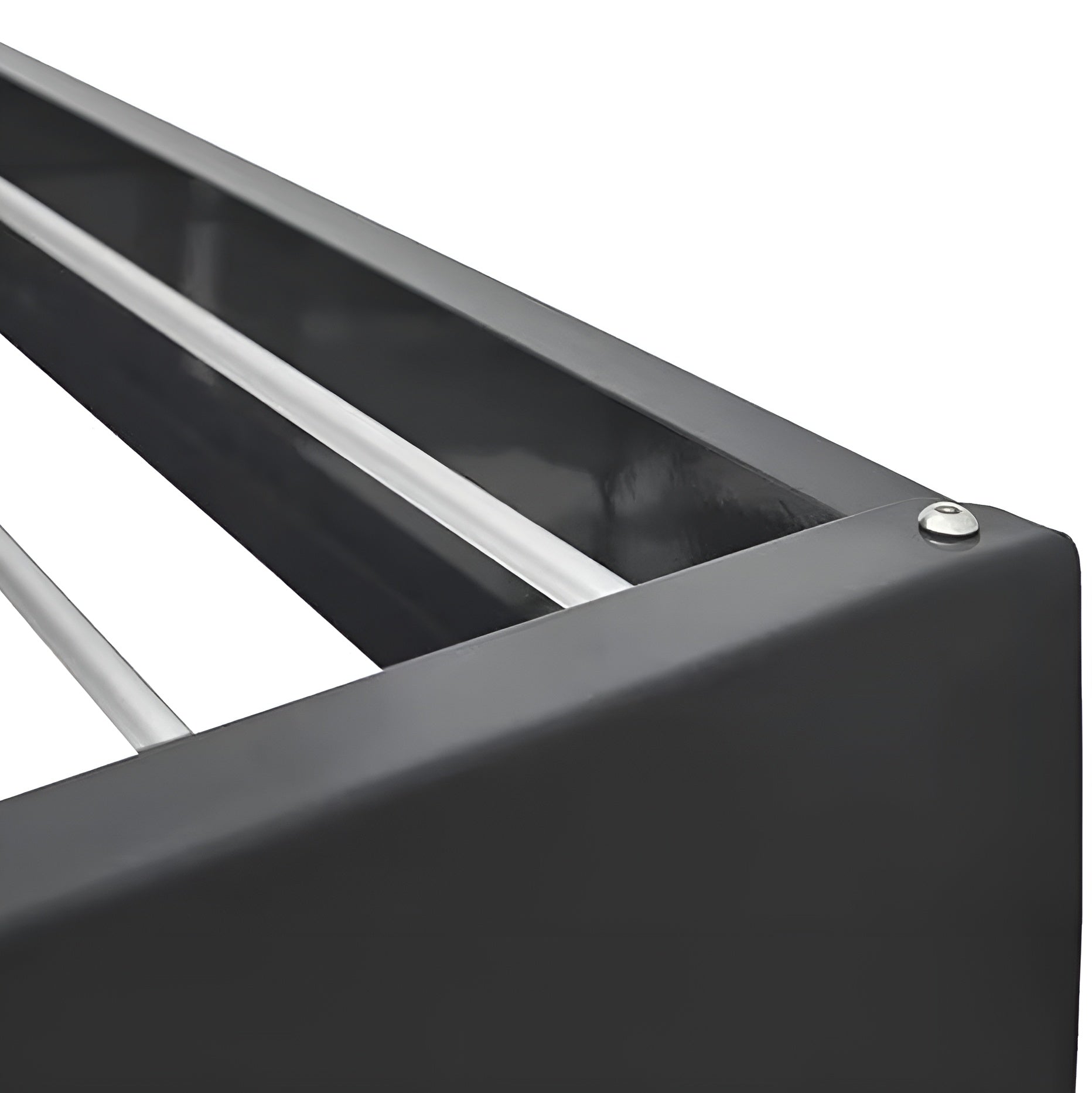 Close-up of a black metal frame with horizontal bars on a white background
