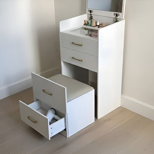 White vanity unit with step stool and open drawers in a bathroom setting