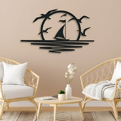 Decorative wall art with sailboat and birds on a beige wall above a living room setup.