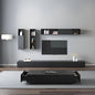 Modern living room with black entertainment unit, TV, and shelves against a gray wall.