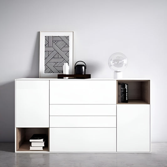 White sideboard with decorative items against a gray wall
