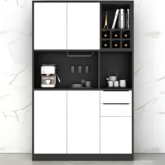 Black and white kitchen cabinet with appliances and items on a light gray background