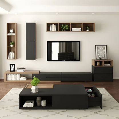 Modern living room with black and wooden furniture, including a TV stand and shelves.