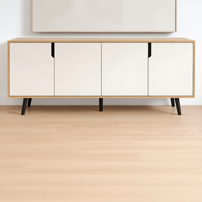 Wooden sideboard with white doors on a wooden floor and white wall background