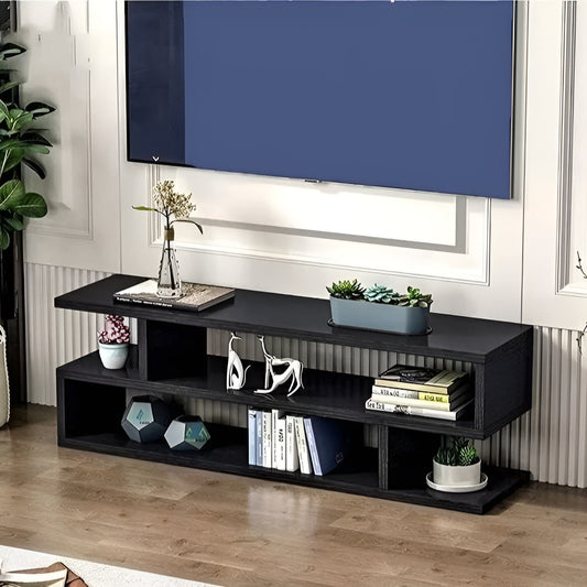 Black TV stand with decorative items in a living room setting