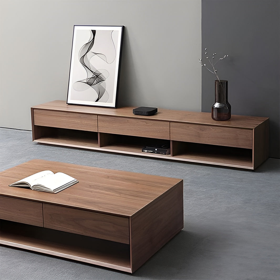 Wooden TV stand with a coffee table in a modern living room setting.