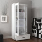 White display cabinet with glass doors in a room with decorative elements.