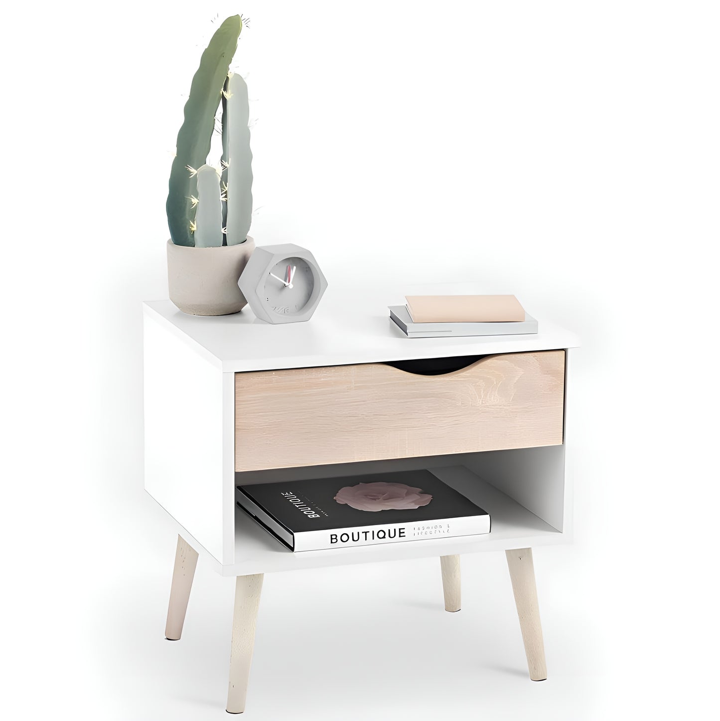 Small wooden side table with a drawer, books, and a cactus on a white background