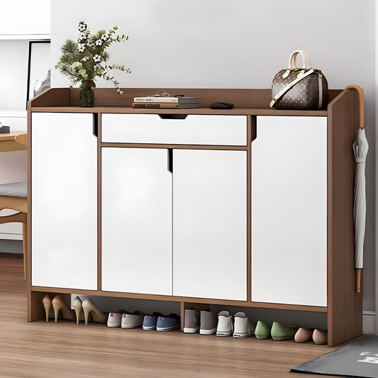 Wooden shoe cabinet with mirrored doors and shoes underneath, in a room setting.