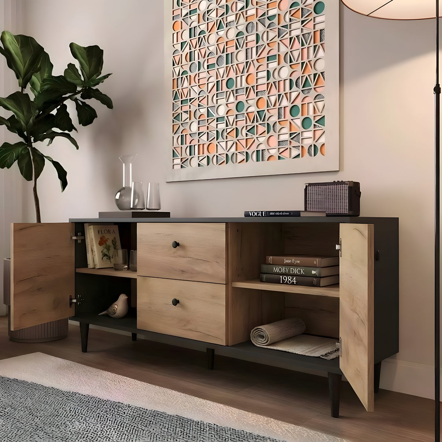 Wooden entertainment console with open doors in a room with a geometric wall art piece.