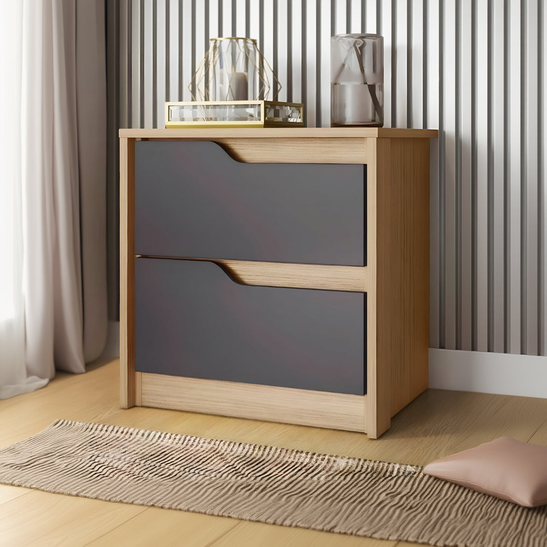 Wooden dresser with two drawers, one gray and one natural wood, against a striped wall.