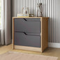 Two-drawer dresser with gray drawers and wooden frame against a striped wall.