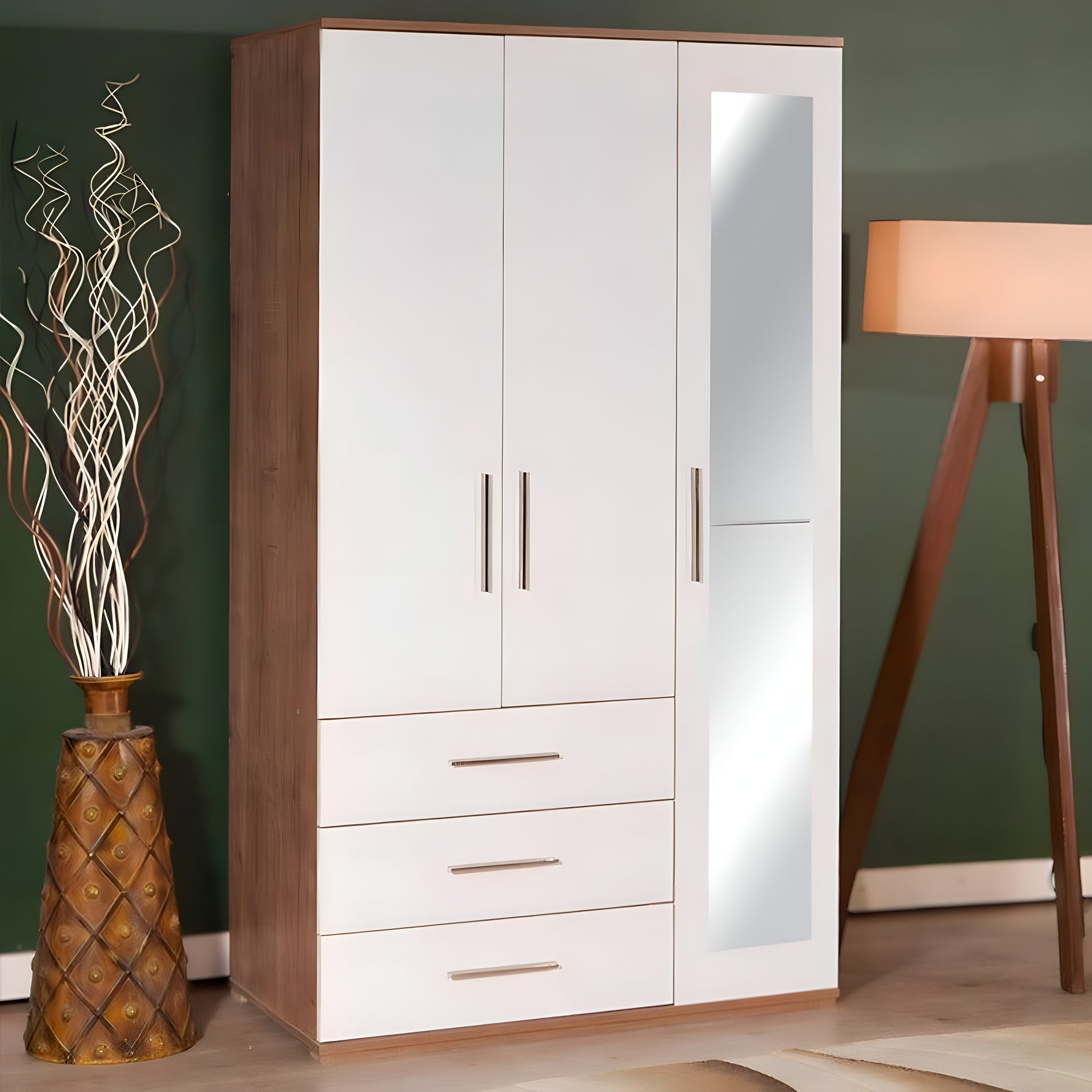 White wardrobe with wooden accents against a green wall