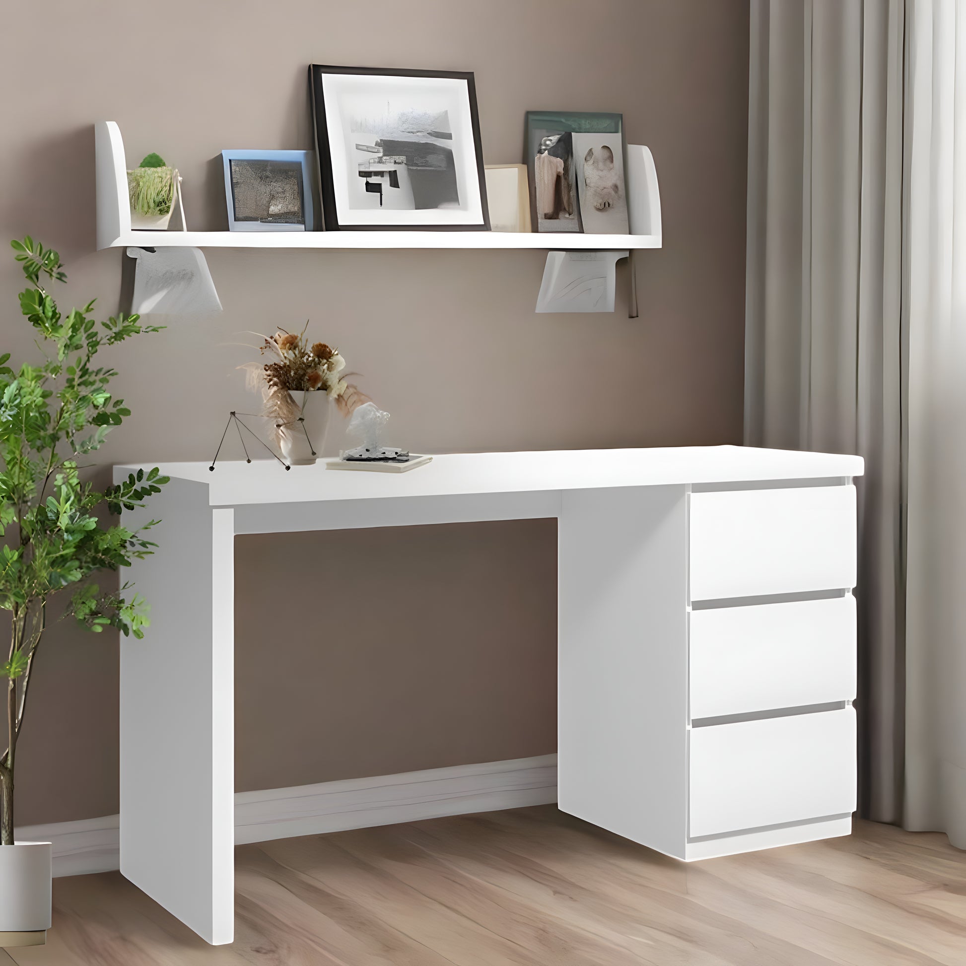 White desk with drawers in a room with a brown wall and a shelf with decorative items.