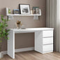 White desk with drawers in a room with a brown wall and a shelf with decorative items.
