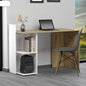 Modern corner desk with a laptop, books, and a backpack in a home office setting.
