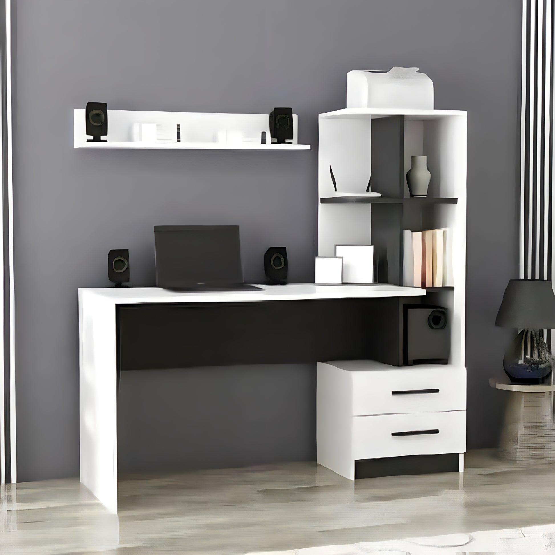 Modern office setup with a white L-shaped desk, shelves, and computer equipment against a gray wall.
