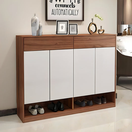 Wooden shoe cabinet with white doors in a room setting