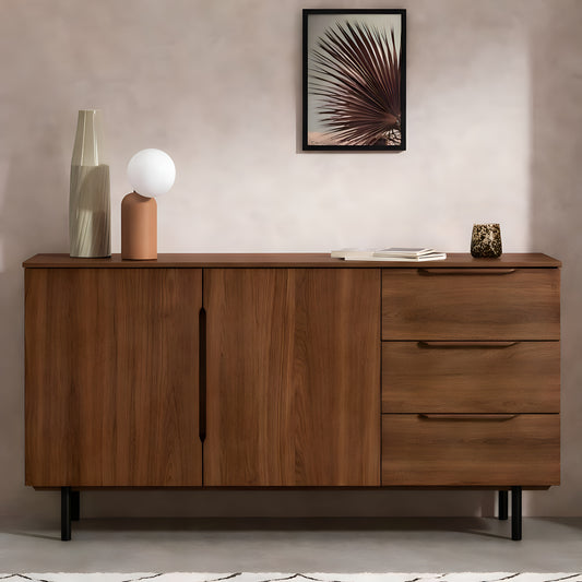 Wooden sideboard with decorative items against a neutral wall.