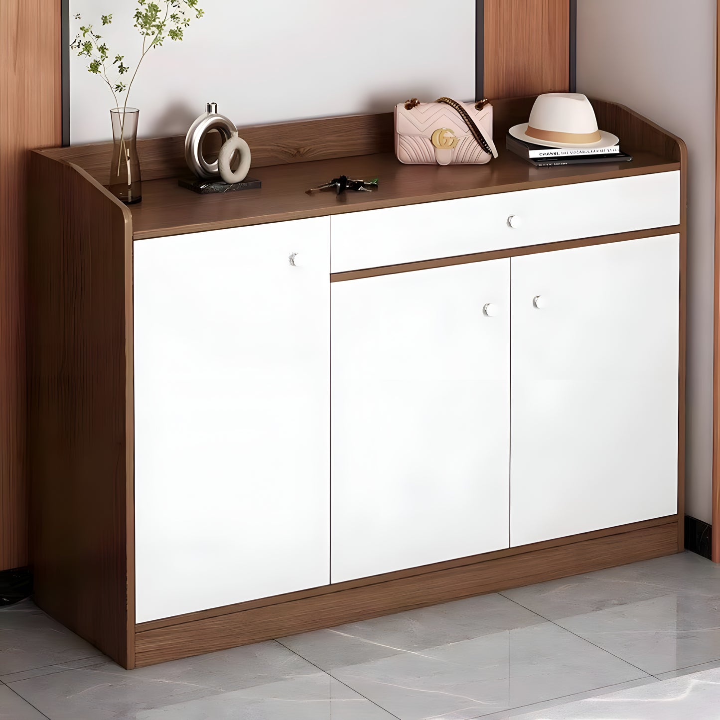 Wooden shoe cabinet with white doors in a room setting