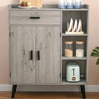 Wooden cabinet with doors and shelves against a plain wall.