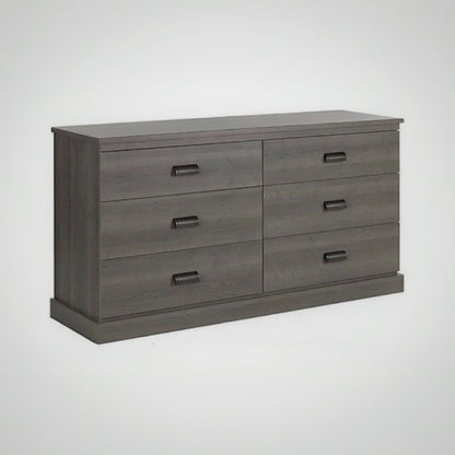 Gray dresser with four drawers on a white background
