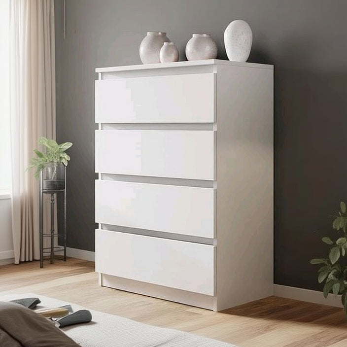 White dresser with decorative vases against a gray wall