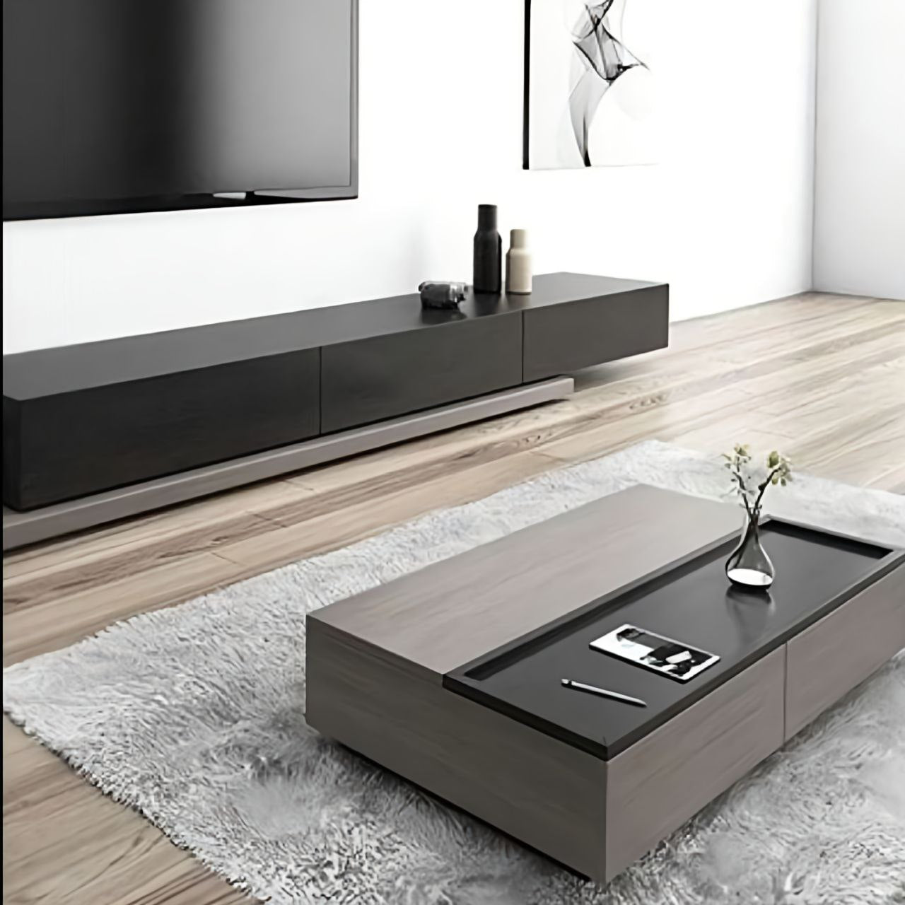 Modern living room with a television and coffee table.