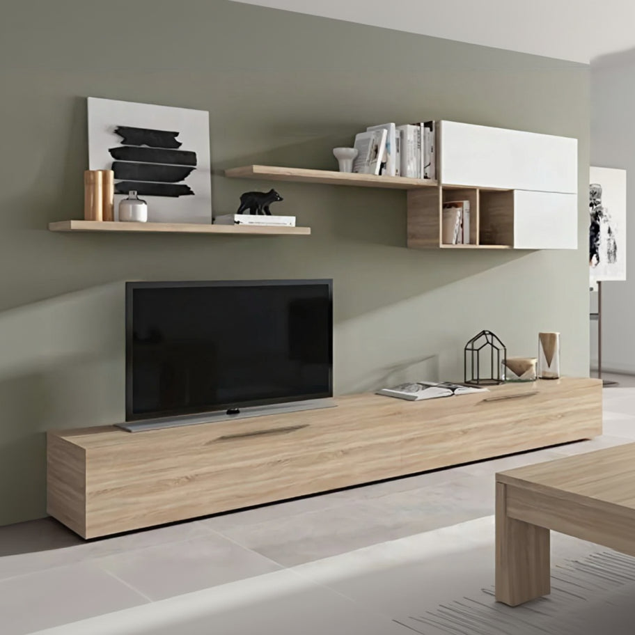 Modern living room setup with a TV on a wooden stand, shelves, and decor.