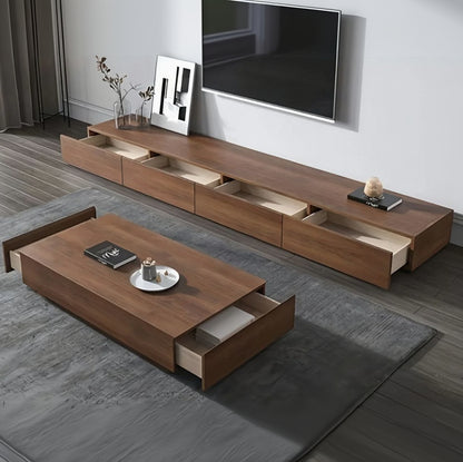 Wooden TV stand with drawers and a matching coffee table in a living room setting.