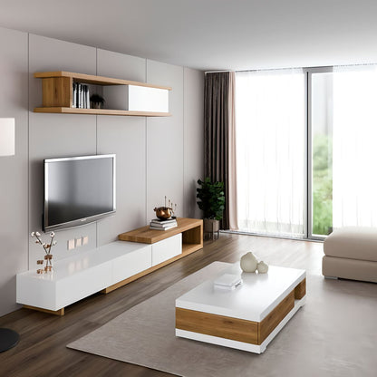 Modern living room with a TV unit, coffee table, and decorative items.